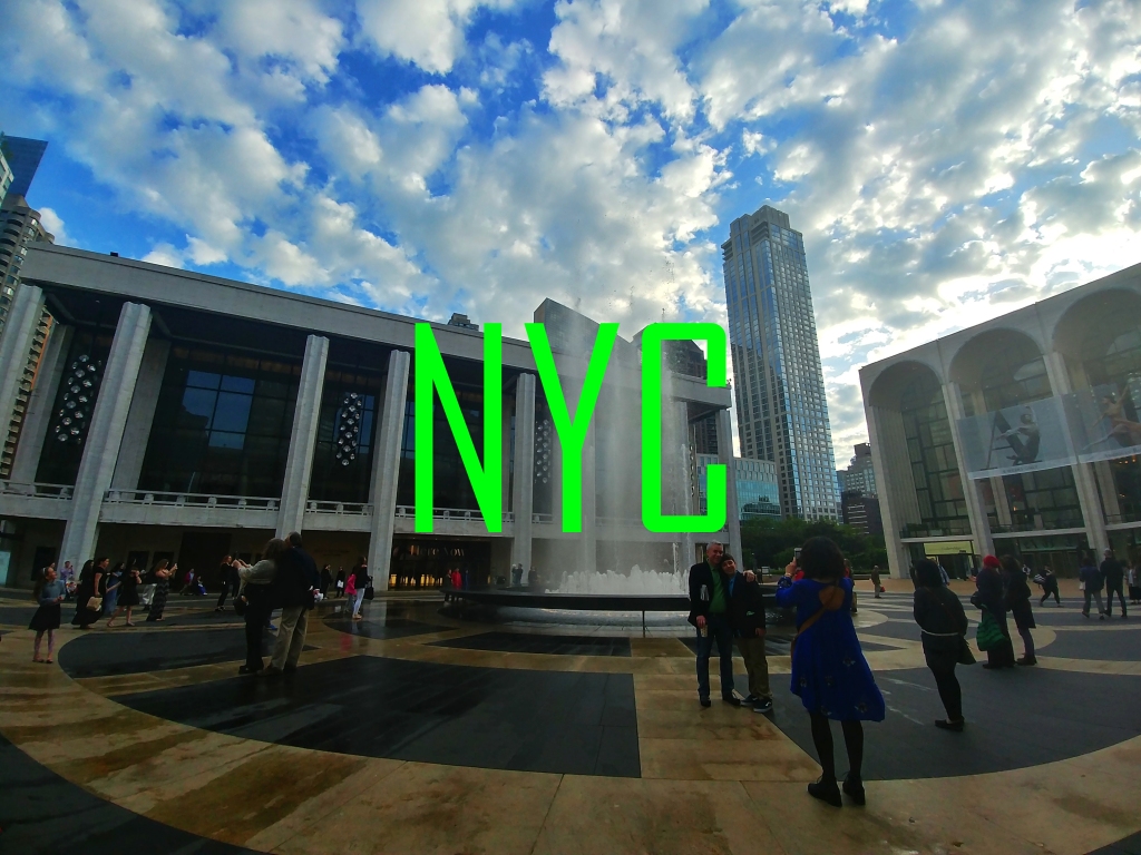 The fountain at Lincoln Center with green text over the picture that reads "NYC".

Click through for more New York City photos