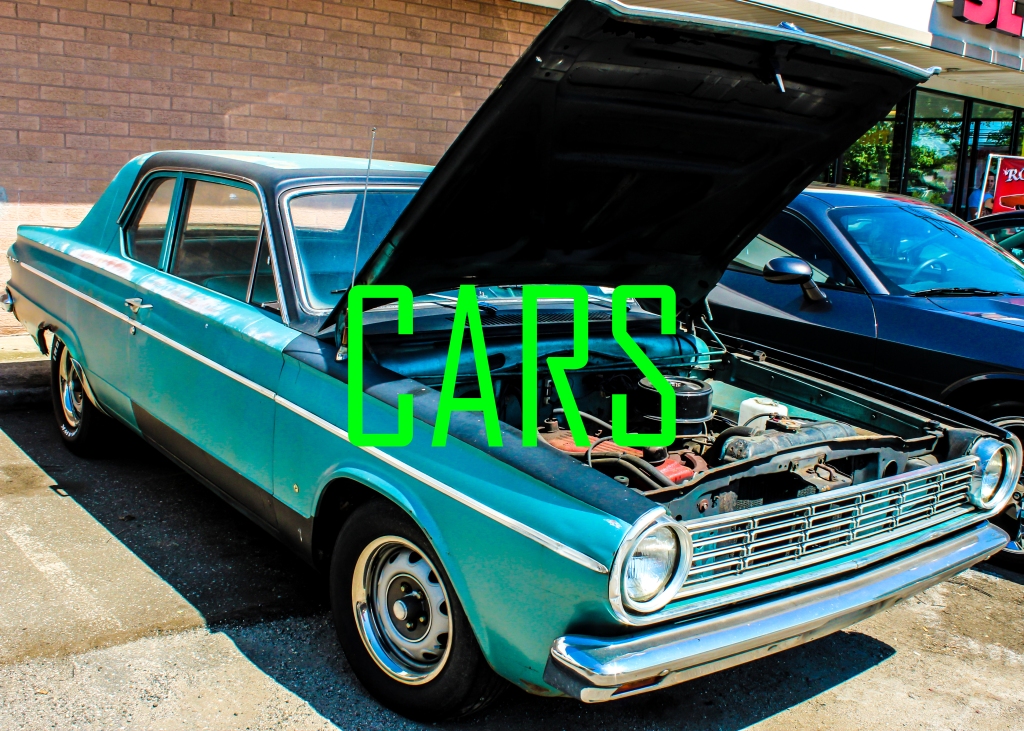 A 1960s Dodge Dart (light blue) with the hood up. There is green lettering across the picture that reads "CARS".

Click through for more CAR photos